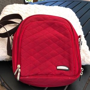 Travelon Brand red purse w/brown adjustable strap